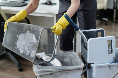 Emptying the workplace waste basket