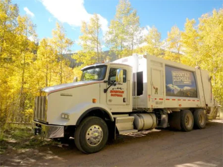 Garbage pickup in Colorado City with curbside totes for rural homes